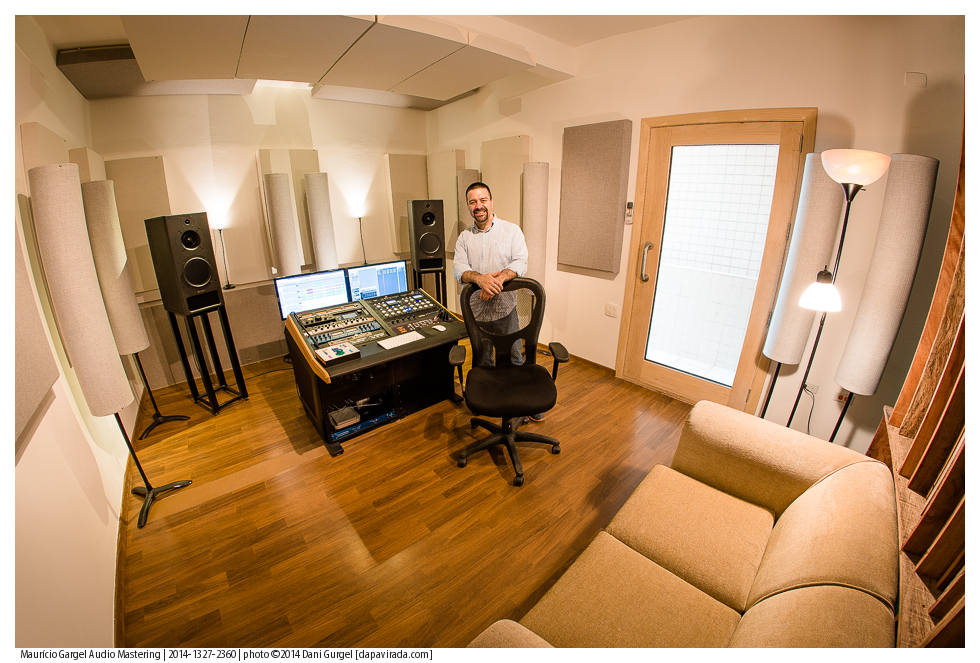 angeled photo of Mauricio Gargel posing with his ASC studiotraps and acoustic treatments in this studio