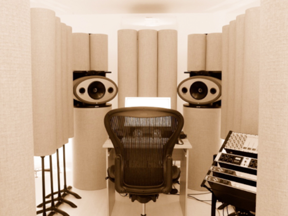 white asc studiotrap bass traps in a quicksoundfield configuration in a mixing studio